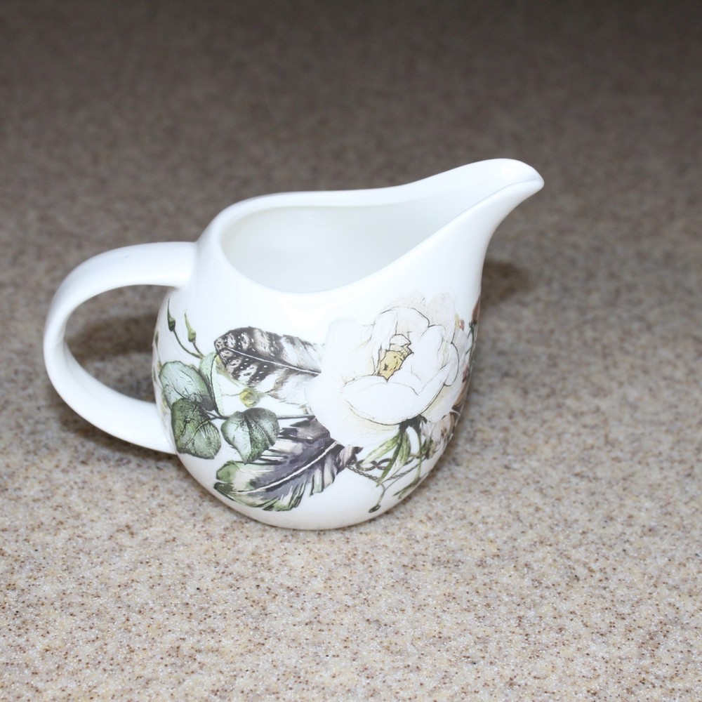 New Upcycled altered decor creamer boho floral feather motif.